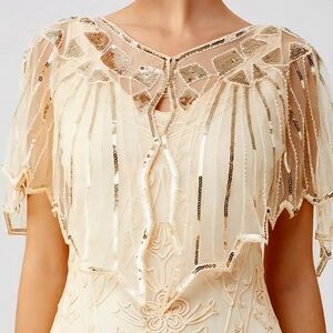  This Is a gold sequin and beaded 1920s-style flapper shawl or evening cape. 